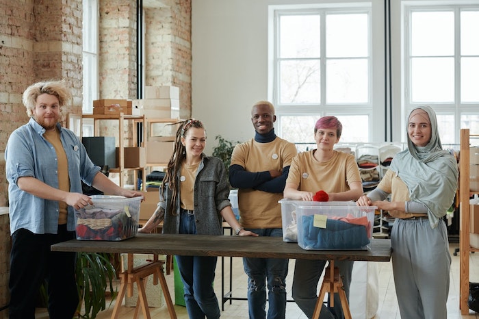 Nonprofit volunteers with donated items